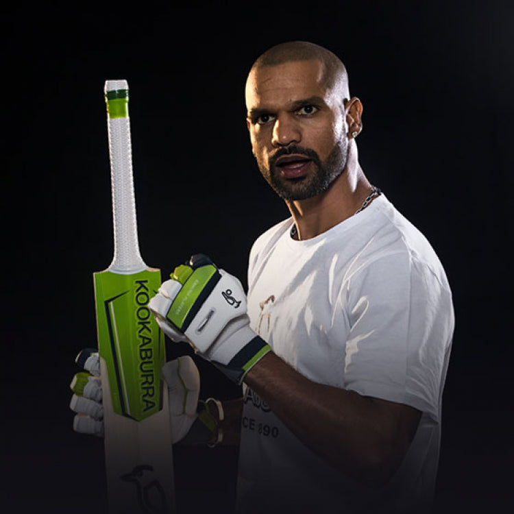 Kookaburra campaign cricketer with a green cricket bat