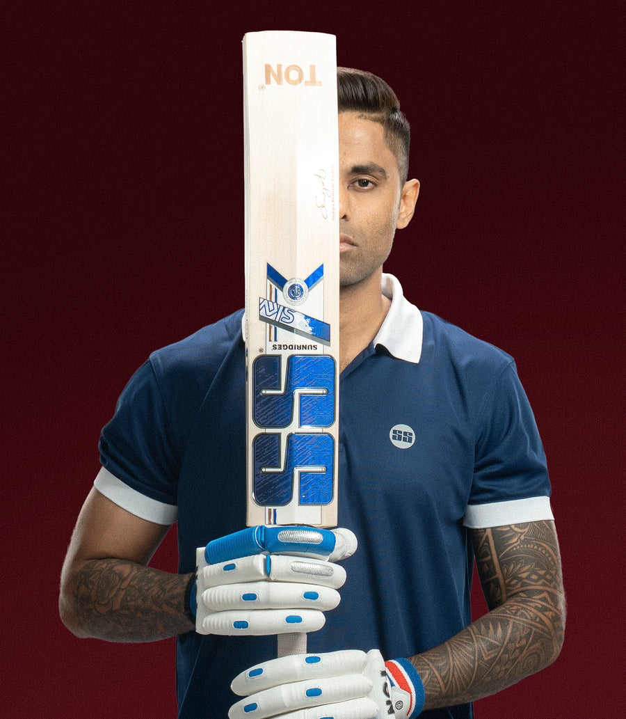 SS campaign cricketer holding a bat and wearing batting gloves